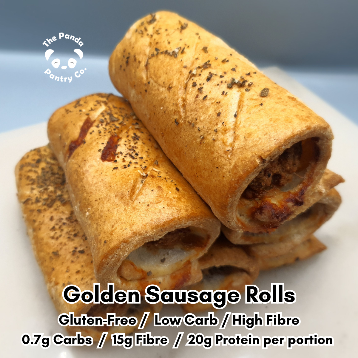 Golden sausage rolls on a white plate with 'The Panda Pantry Co.' branding.